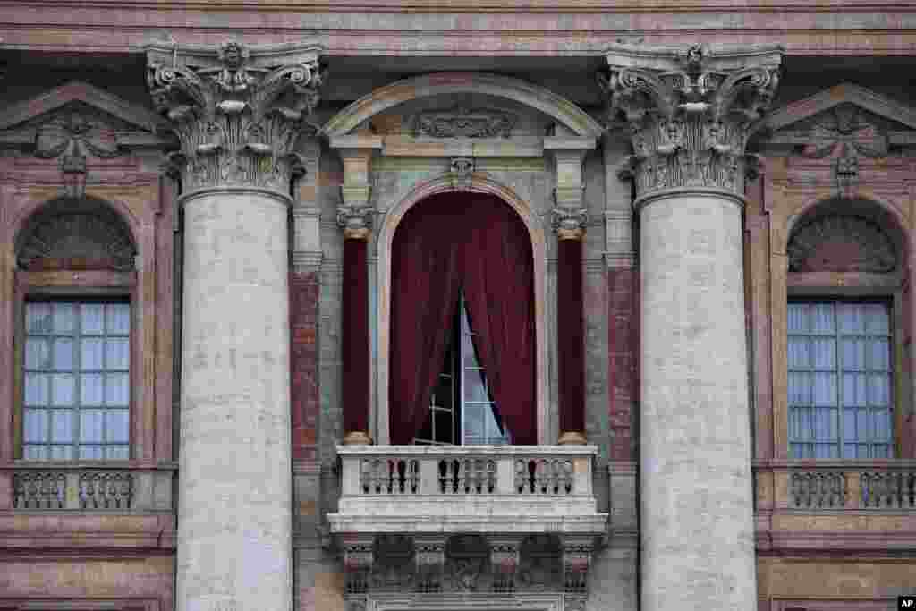 A view of the balcony on the facade of Saint Peter's Basilica where the newly elected pope will make his first appearance to salute the cheering crowd, at the Vatican, March 11, 2013.