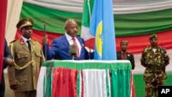 FILE - Burundi's President Pierre Nkurunziza is sworn in for a third term at a ceremony in the parliament in Bujumbura, Aug. 20, 2015.