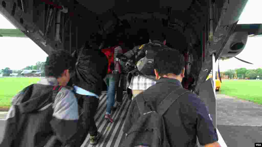 Journalists embedded with the search and rescue misson boarding CN 295
