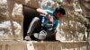 Rocket Attacks Kill More Than 20 in Two Syrian Towns