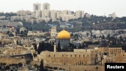 A general view of Jerusalem's old city shows the Dome of the Rock in the compound known to Muslims as Noble Sanctuary and to Jews as Temple Mount, Oct. 25, 2015. Jordan, the custodian of the shrine, says video surveillance project of the shrine is moving forward, but that it's still in the phase of technical preparations.